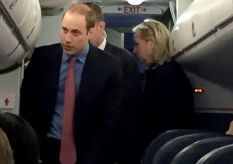 A picture of Prince William entering coach.